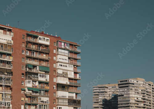 Residential buildings of Madrid with blue clear sky 
