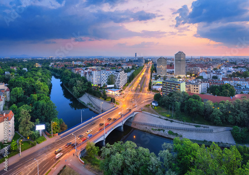 Wroclaw, Poland. Aerial view of Szczytnicki bridge over Stara Odra river and Plac Grunwaldzki street at dusk