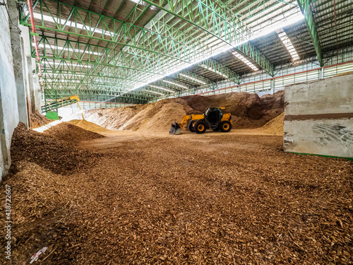 Wood chipper was kept in biomass power plant by apply to fuel of burner.