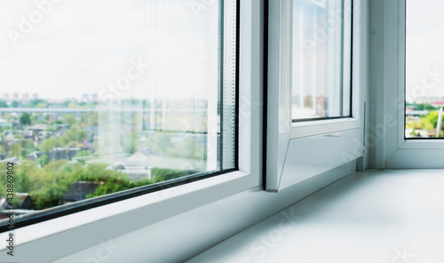 Plastic window with sash on the balcony