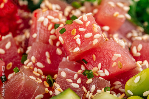 Closeup on hawaiian tuna poke bowl with vegetables