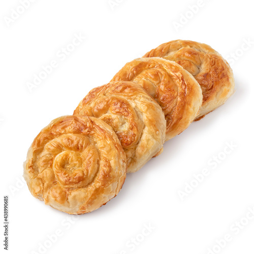 Row of Turkish borek stuffed with cheese on white background