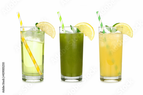 Group of summer iced green teas in glasses with paper straws isolated on a white background. Iced green tea, iced matcha lemonade and iced green tea lemonade.