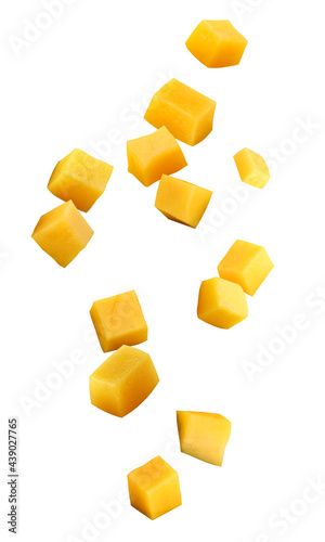falling mango chunks isolated on a white background