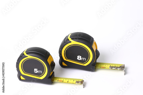 Flexometers or measuring tapes on white background