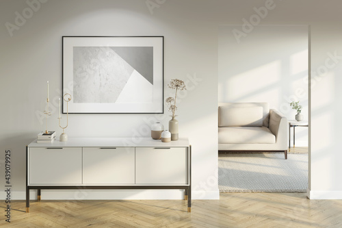 Modern white interior with an illuminated horizontal poster above a light-colored cabinet with decor, a doorway to a room with a sofa, and a coffee table with a parquet floor. Front view. 3d render