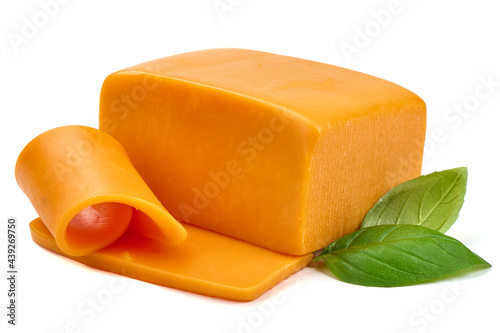 Piece of Cheddar cheese, isolated on white background. High resolution image