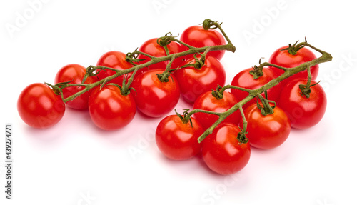 Fresh cherry tomatoes, isolated on a white background. High resolution image.