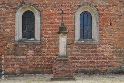 Missionary cross from 1841 in front of the Church of the Exaltation of the Holy Cross in Zakroczym, Poland 