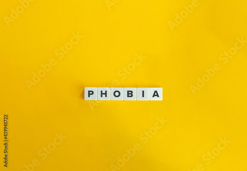 Phobia banner and concept. Block letters on bright orange background. Minimal aesthetics.
