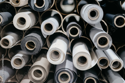 Closeup of rolls of textile and fabric for roller blinds in a factory