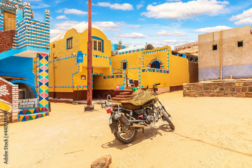 Traditional Nubian village in Africa and an authentic motorbike, Egypt