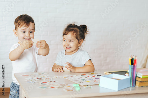 Children play educational games in the school class