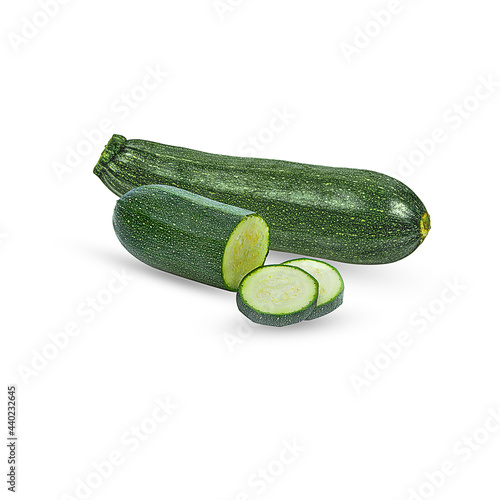 fresh zucchini and slice isolated on white background