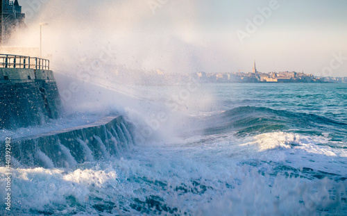 High tide and splashing wave in Saint Malo