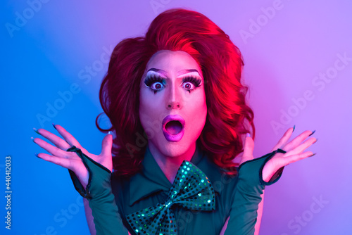 Happy drag queen having fun acting surprised in front of camera - LGBTQ concept