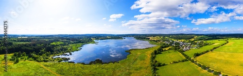 the westerwald forest with the dreifelder weiher lake in germany panorama