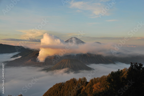 Landscape nature Bromo Mountain in the morning and many fog around Bromo mountain with sunrise is an active volcano at Bromo Tengger Semeru National Park , East Java, Indonesia or call gunung bromo