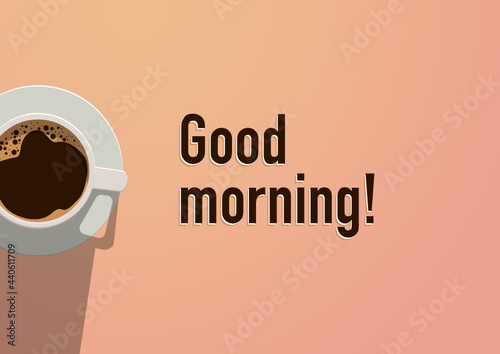 Filiżanka aromatycznej porannej kawy i napis "Good morning!". Tło dla kawiarni lub restauracji. Szablon ulotki lub menu. Rzut z góry z miejscem na Twój tekst.