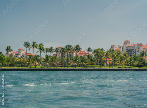 tropical island with trees fisher island Miami Florida usa luxury palms panorama sea 