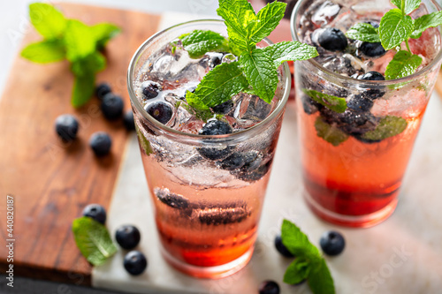 Blueberry mojito in tall glasses with mint