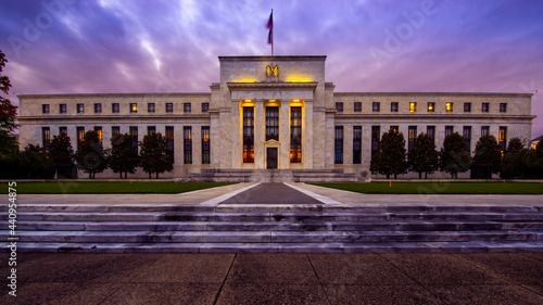 Front of the United States Federal Reserve Bank, the government agency that controls interest rates, at sunset in Washington DC in the Summer.