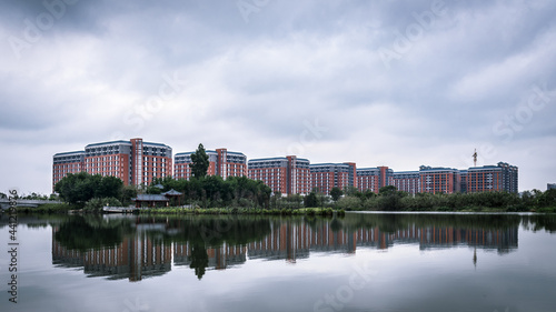 Teaching building of Guangzhou Xinhua College Dongguan Campus. Cityscape of Dongguan, China. 