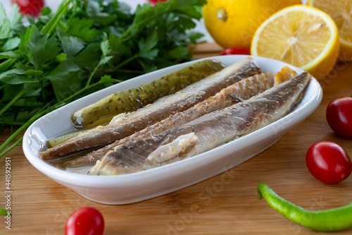 Fillet mackerel on wooden background. Seafood dishes. local name isli uskumru