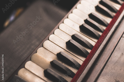 Harmonium keys with vintage looks stock image, selective focus.