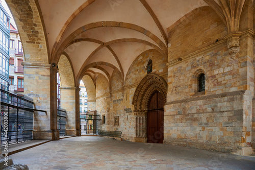 View of the vaulted arcade sheltering the east door of the Catedral de Santiago in the Old Town (Casco Viejo) Bilbao
