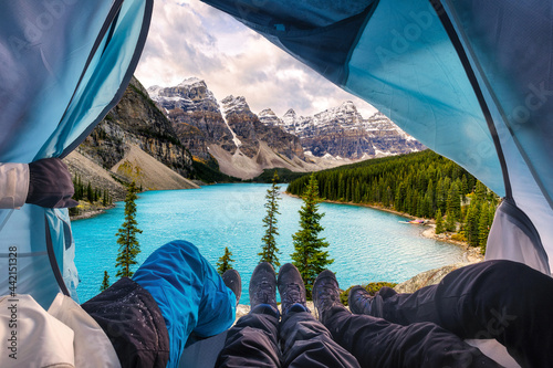 Group of mountaineer resting and enjoying view of Moraine Lake at national park