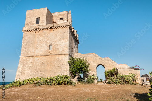 View of the historical fortification tower - Torre Colimena in village Manduria, province of Taranto, Puglia, Italy