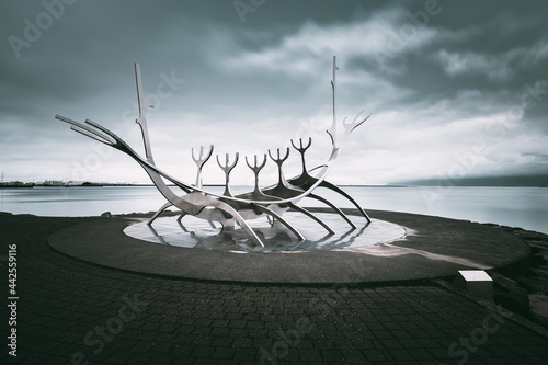 Perspective view of the Sun Voyager Sculpture against dramatic sky, Reykjavìk, Iceland