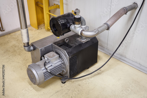 Vacuum oil pump with filter.