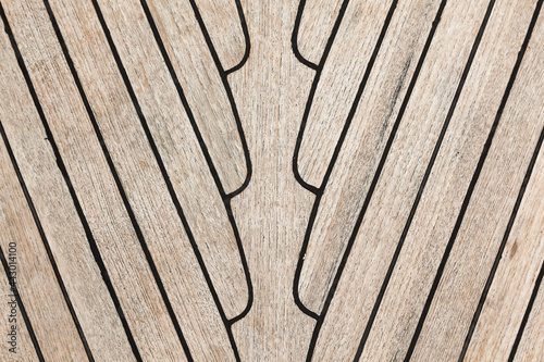 Texture of teak deck on a yacht closeup.