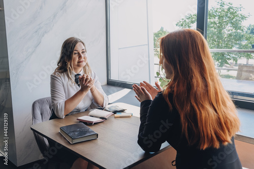 Mental health, wellness, support, emotional stress, therapy concept. Communication session of woman psychologist and client. Psychotherapy or talk therapy