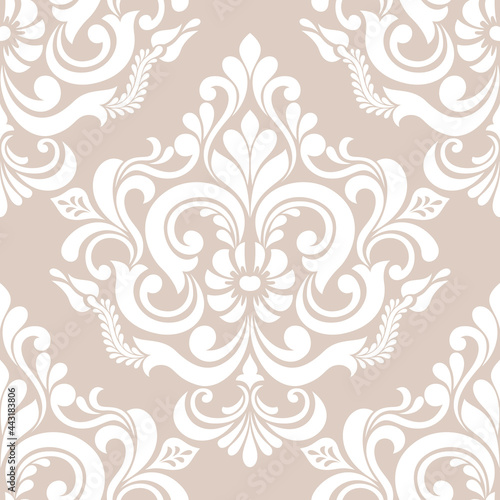 Damask seamless vector background. Wallpaper in the baroque style template. Beige and white floral element. Graphic ornate pattern for wallpaper, fabric, packaging, wrapping. Damask flower ornament.