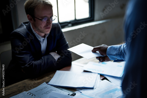 Businessman being served a lawsuit