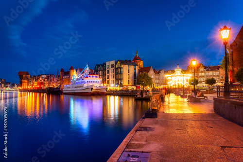 Beautiful scenery of Gdansk city at dusk over the Motlawa river. Poland