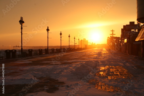 sunset in winter on the Ocean City, New Jersey boardwalk