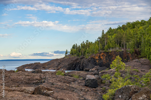 Coastline of Lake Superior with blue sky and white clouds, Michigan, USA