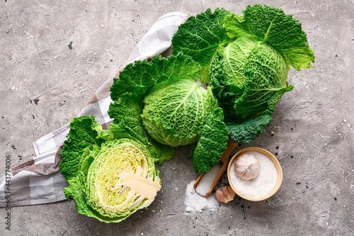 Fresh savoy cabbage on grunge background