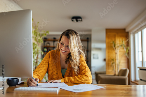 Adult woman, working hard on a busy day.