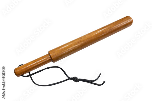 Antique wood truncheon club from the 1920s isolated on white.