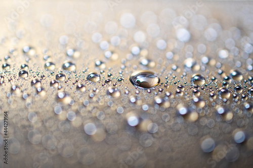 Drops of water on surface, abstract background