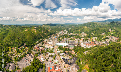 Aerial view of Gatlinburg above US-441. Gatlinburg is a popular mountain resort city in Sevier County, Tennessee, as it rests on the border of Great Smoky Mountains National Park.