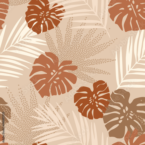 Tropical seamless pattern with terracotta dotted palm leaves silhouettes. Jungle stipple vector art.