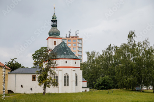 Krasne Brezno, Bohemia, Czech Republic, 26 June 2021: Saxony style renaissance church of St. Florian with white tower and gothic windows, National cultural monument in summer day