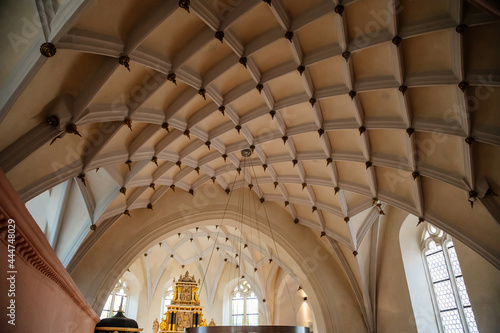 Krasne Brezno, Bohemia, Czech Republic, 26 June 2021: Saxony style renaissance church of St. Florian, temple interior ceiling with stone ribs and wooden decorations