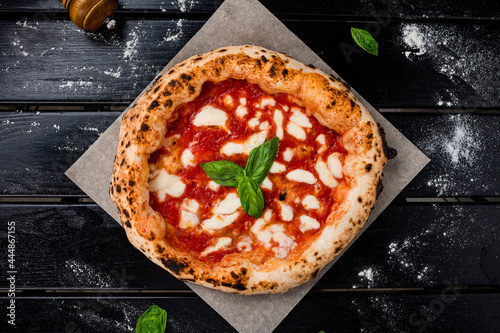 true Italian Pizza. Traditional Pizza Margherita with fresh mozzarella and basil